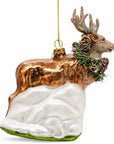 Reindeer with Pine Garland and Snowy Trees Glass Christmas Ornament