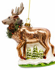 Reindeer with Pine Garland and Snowy Trees Glass Christmas Ornament